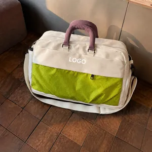 Large capacity travel duffel bag for women, expandable canvas weekender bag for short trips.