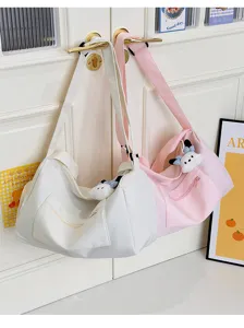 Large capacity travel gym bag for women, stylish casual shoulder crossbody bag with cute plush.