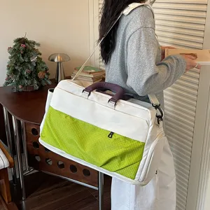 Large capacity travel duffel bag with expandable design for women, fitness and weekend trips.