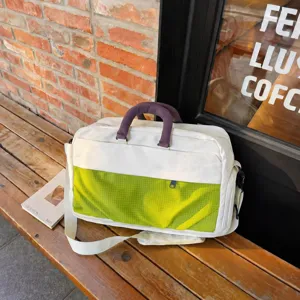 Large capacity travel duffel bag with expandable design, stylish hand-held gym fitness bag for women.