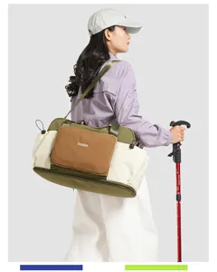 Color-blocked travel duffel bag with wet-dry separation and shoulder strap detail view.