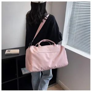 Pink travel duffel bag large capacity fitness gym bag with shoulder strap for short trips.