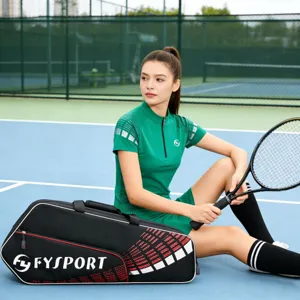Detail shot showing a large capacity black red sports racket bag on tennis court scene.