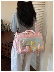Detail view of the stylish large capacity gym yoga travel bag with cute star decorations.