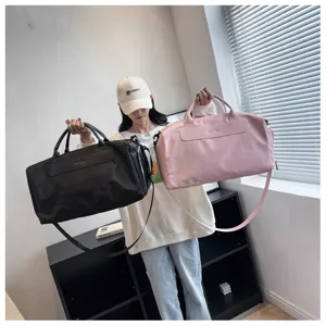 Large capacity travel duffel bag with shoe compartment, minimalist waterproof gym luggage bag.