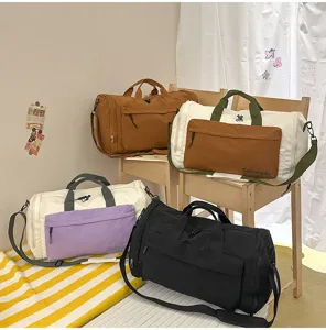 Detailed view of large capacity multi-color travel duffel bag showcasing various colors.