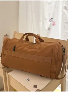 Large capacity travel duffel bag in brown, perfect for short trips, gym and fitness use.