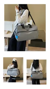 Detail de sac de voyage gris avec grande capacite et sangle confortable pour courts sejours.