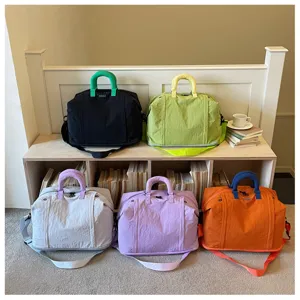 Detailed view of large capacity waterproof gym travel duffel bag in multi color options.