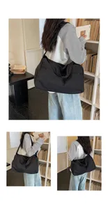 Large capacity travel duffel bag for women and men, lightweight gym bag with shoulder strap.
