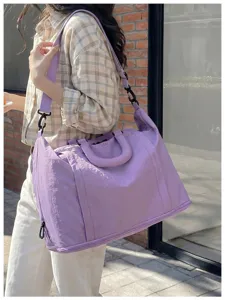 Large capacity travel duffel bag in soft purple, lightweight and perfect for fitness or short trips.