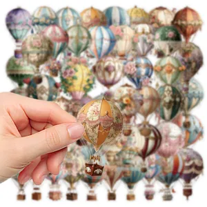 Detailed view of vintage hot air balloon sticker, clear transparent edge for journaling craft.