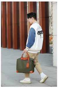 Fashion casual travel duffel bag for men and women, stylish nylon hand luggage bag.