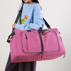 Foldable travel duffel bag large capacity pink overnight luggage bag with shoulder strap