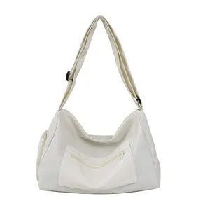Large capacity casual shoulder bag for women, lightweight travel duffel and stylish gym crossbody.