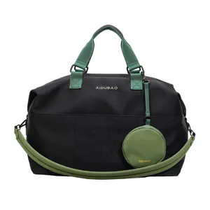Borsa da viaggio nera con manici verdi e borsetta per sport, fitness e viaggi del fine settimana.