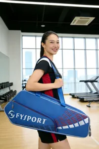 Large capacity blue badminton tennis racket bag with shoulder strap for sports outdoor fitness.
