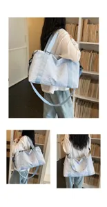 Large capacity travel duffel bag for women, lightweight gym and yoga luggage bag with strap.