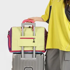 Grande borsa da viaggio per donna, borsone sportivo e weekend con fascia per trolley.