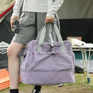 Large capacity travel duffel bag with expandable design for camping and short trips.