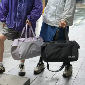 Large capacity travel duffel bag waterproof multi-functional luggage bag for short trips.