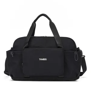 Black nylon travel duffel bag with handles and wet dry compartment for gym and sports main view
