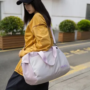 Large capacity travel duffel bag for women and men, waterproof weekend overnight sports gym bag.