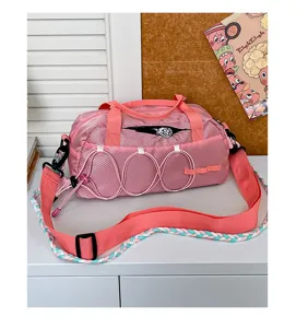 Waterproof sports duffel bag for gym, fitness, and short travel with stylish pink design.