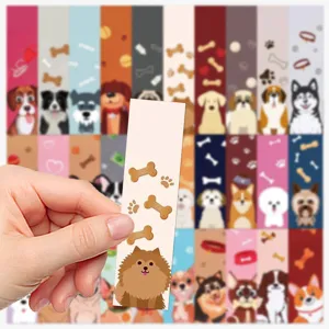 Vue détaillée de marque-page chien, illustrations de chiots mignons, idéal pour la lecture d'étudiants.