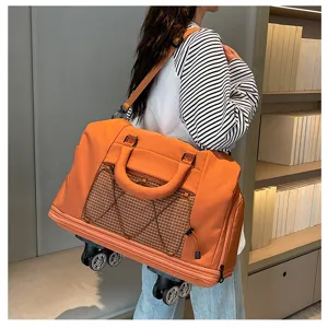 Large capacity rolling travel duffel bag for short trips, lightweight, orange, with wheels.