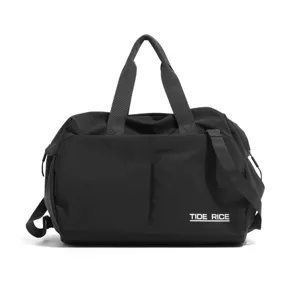 Black travel duffel bag, large capacity short-distance luggage with shoulder strap.