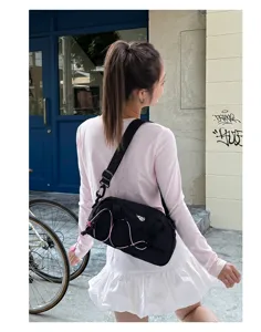 Waterproof outdoor sports cross-body bag, casual trendy design for commuters and travel.