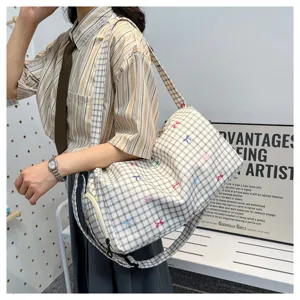 Casual plaid travel duffel bag with large capacity, lightweight and cute design for trips.