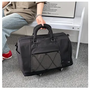 Versatile black rolling travel duffel bag with large capacity, durable wheels, and pocket.