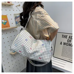 Casual plaid travel bag with cute bow embroidery, large capacity shoulder bag for daily use.