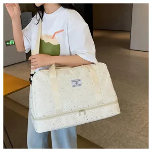 Multifunctional travel duffel bag with star pattern, large capacity fitness gym bag for women.