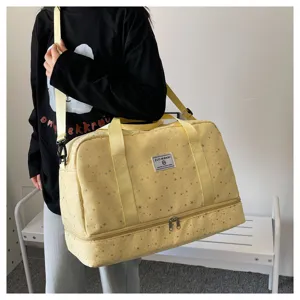 Multifunctional travel duffel bag with separate shoe compartment and star pattern for trips.