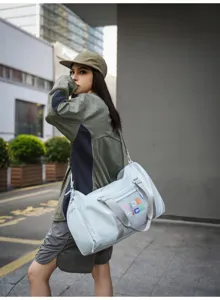 Trendy versatile fitness gym bag with wet dry compartment for travel sports training gear.