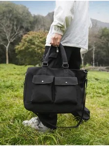 Casual canvas travel bag with large capacity, multi pockets and shoulder strap for outdoor.