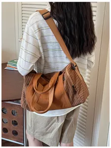 Casual large capacity travel duffel bag for women, stylish canvas and plaid weekender bag with shoulder strap.