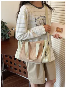 Casual canvas travel bag large capacity shoulder duffel bag for women daily gym and short trips.