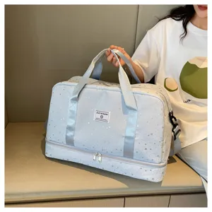 Multifunctional travel duffel bag with star pattern, dry wet separation and shoe compartment.