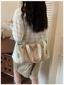 Large canvas travel duffel bag for women, lightweight gym shoulder storage bag daily use.