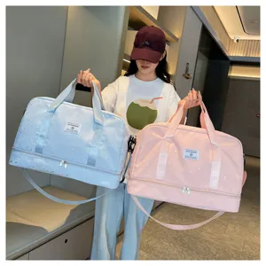 Multifunctional travel duffel bag with wet dry separation and shoe compartment for fitness trips.
