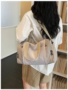 Casual travel duffel bag for women, large capacity canvas gym bag with stylish plaid panels.