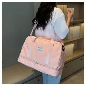 Multifunctional travel duffel bag with separate shoe compartment and waterproof design.