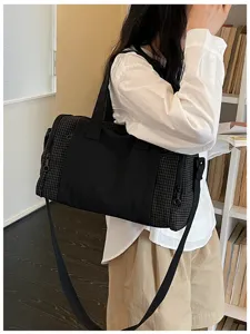 Large capacity travel duffel bag for women, lightweight waterproof fitness gym handbag.