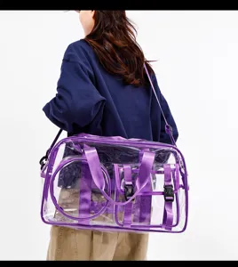 Detail view of transparent purple gym travel bag with multi pockets and straps worn on shoulder
