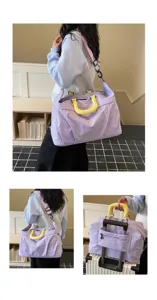 Large capacity travel bag, waterproof gym weekender bag with luggage sleeve for women.