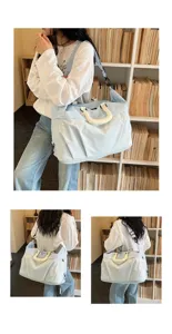 Large capacity travel duffel bag for women, waterproof gym fitness bag with shoulder strap.
